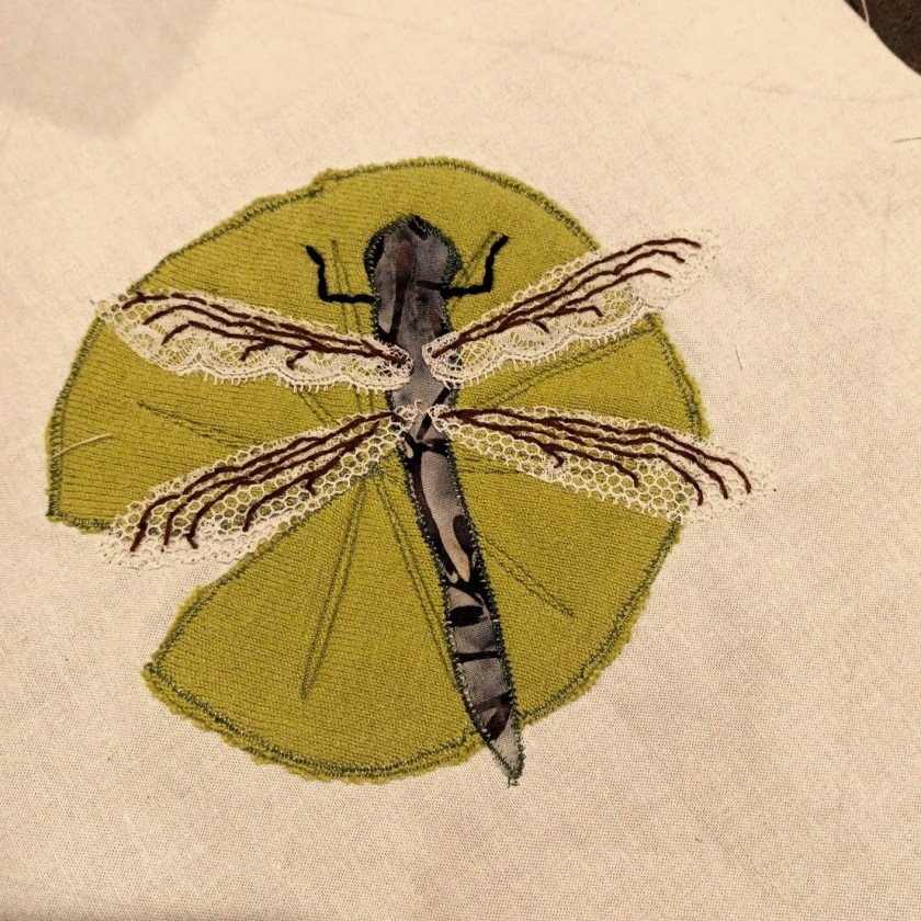 Dragonfly on waterlily